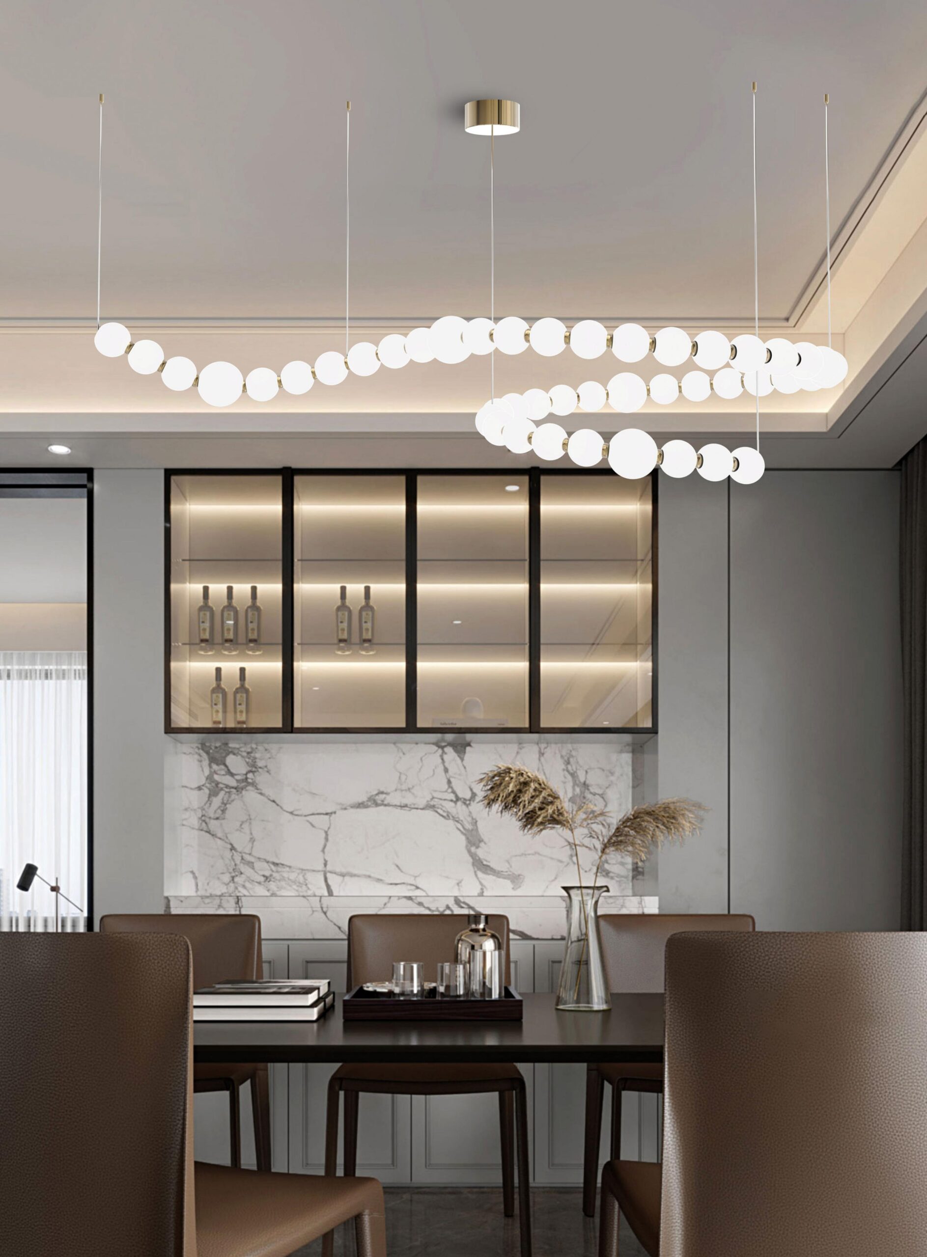An acrylic, pearl-style pendant lighting hang at the living room.