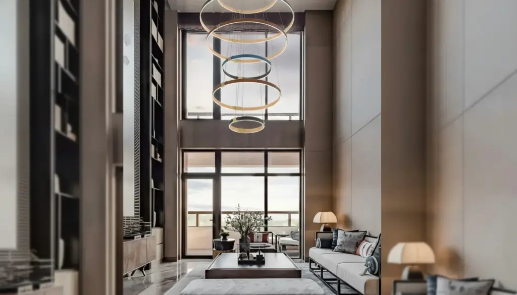 Modern chandelier detail with a leather sleeve fitted around a brushed metal stem