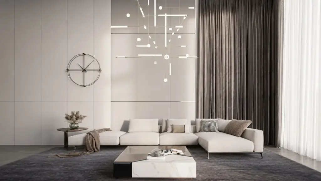 Customer-provided interior image showing a pale living room with a modular sofa, tall curtains and a fine geometric suspended light.